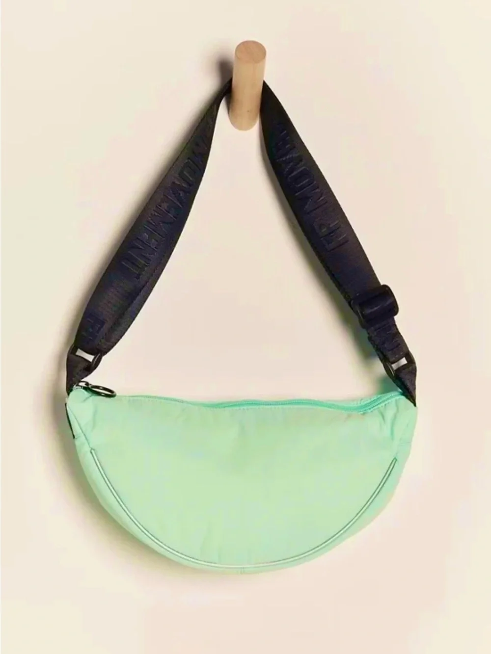 NWT FREE PEOPLE MOVEMENT BULL’S EYE CROSSBODY SLING BAG COLOR IS PISTACHIO!!